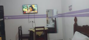 jumbo palace 15k rooms tv, bath (hot & cold water), bed.